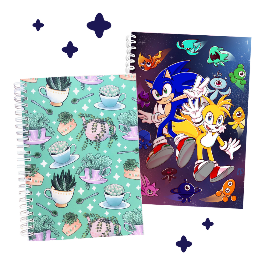 Stickerbook 3 Image of 2 sticker books, left is green and features a pattern of succulents planted into teacups and little spoons, the right features sonic and tails in space, with little wisp creatures floating around them.